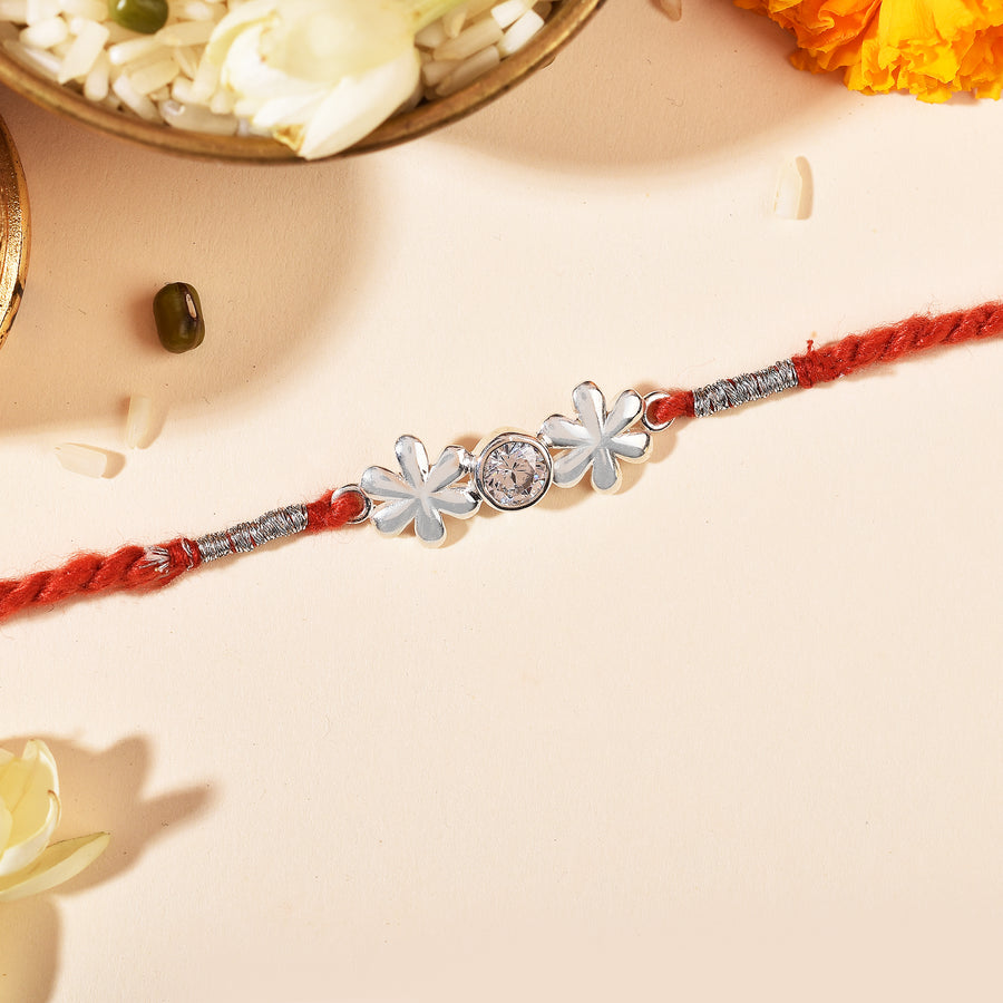 Zircon Twin Flower Silver Rakhi & Bracelet Combo
