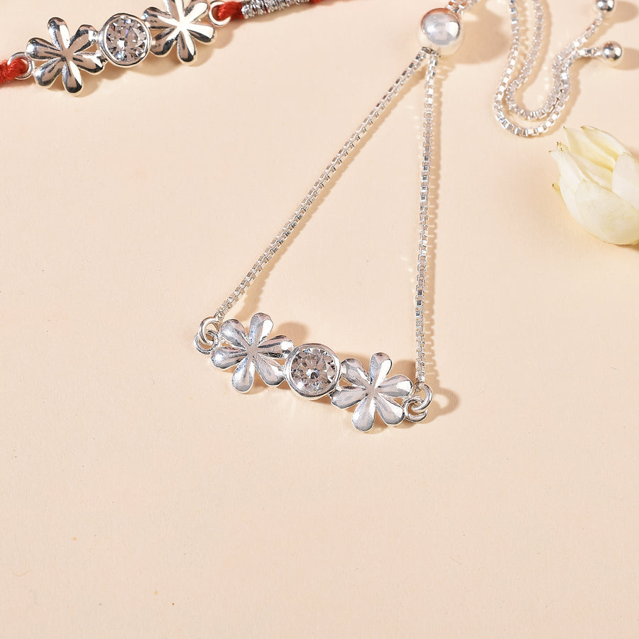 Zircon Twin Flower Silver Rakhi & Bracelet Combo